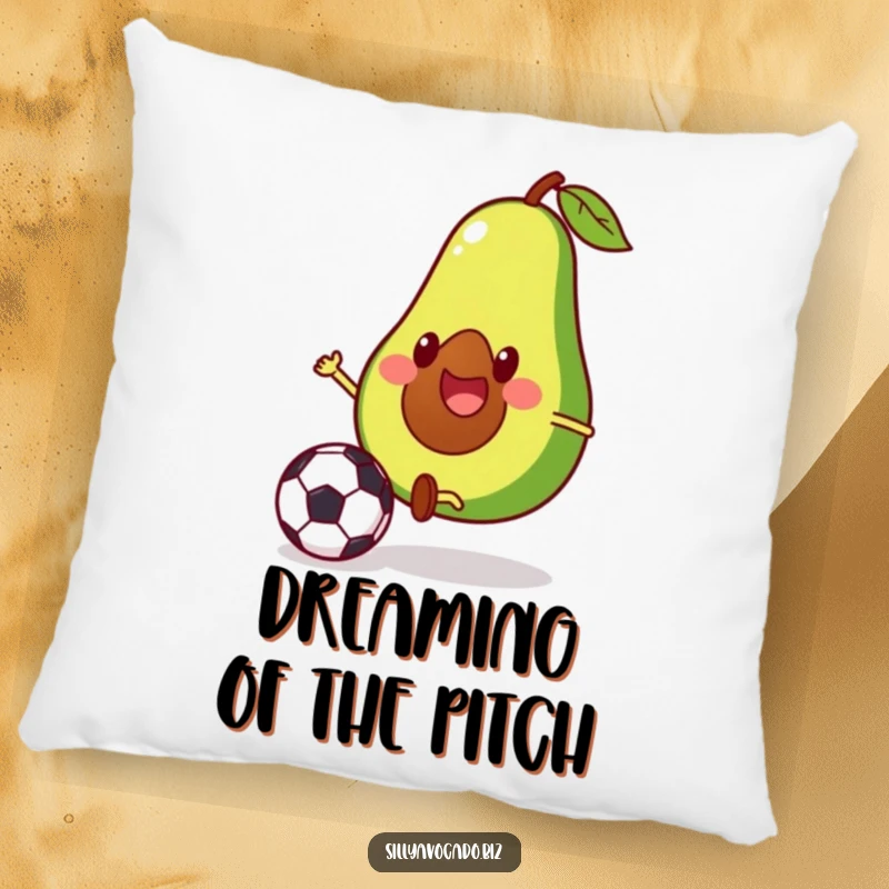 Funny pillow featuring a happy avocado with tiny legs in action, kicking a soccer ball with glee.