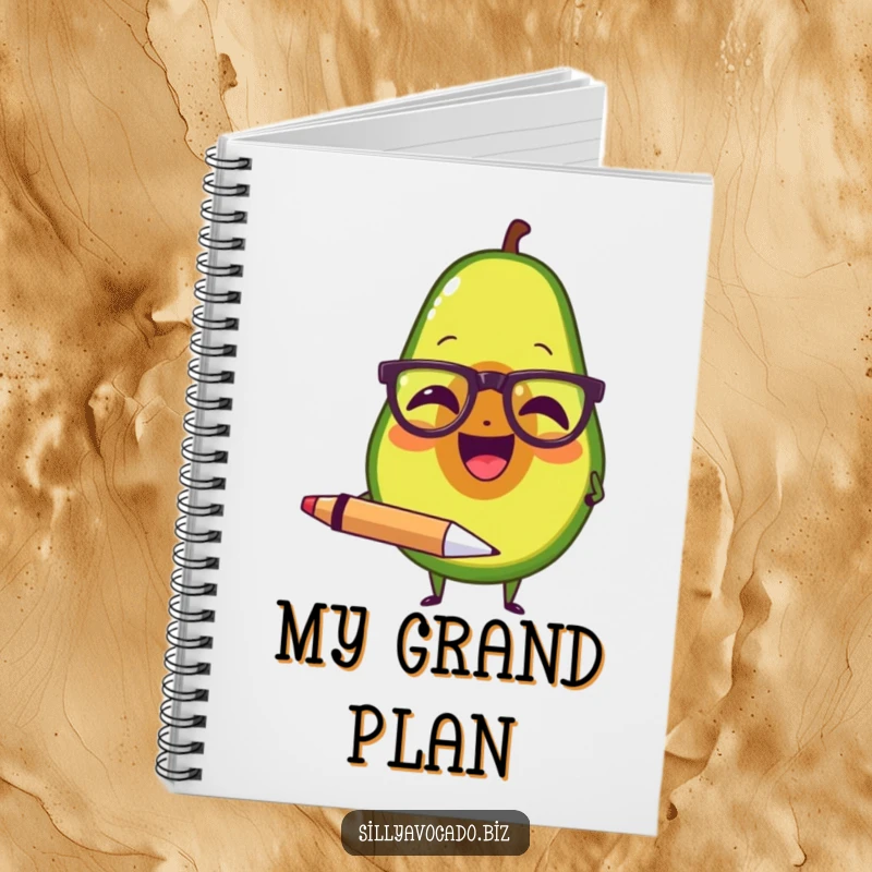 Funny notebook with an avocado wearing tiny spectacles, laughing and holding a large pen, ready for your notes.