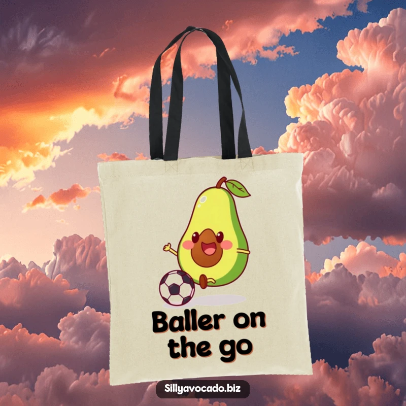 Funny tote bag with a cheerful avocado character playing soccer and kicking a ball with enthusiasm.